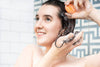 zero waste shampoo bar on wet hair lather